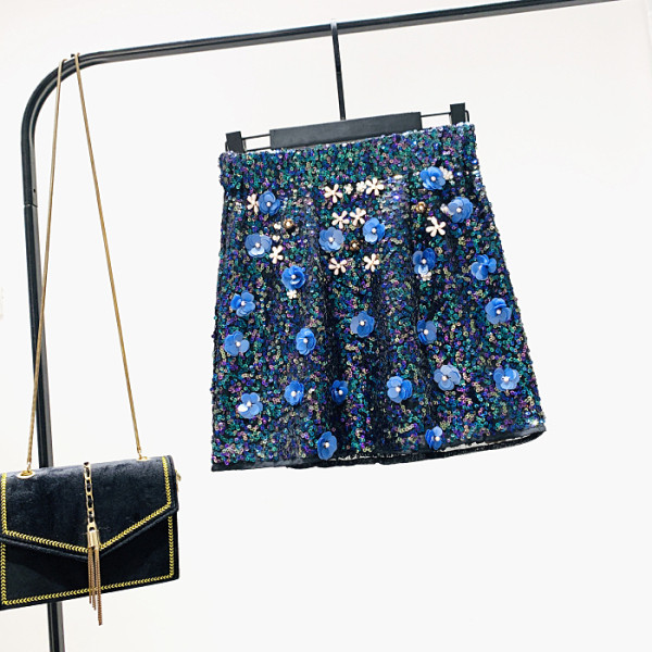 Új modell női szoknya flitterekkel és kék 3D elemmel