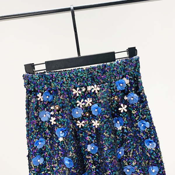 Új modell női szoknya flitterekkel és kék 3D elemmel