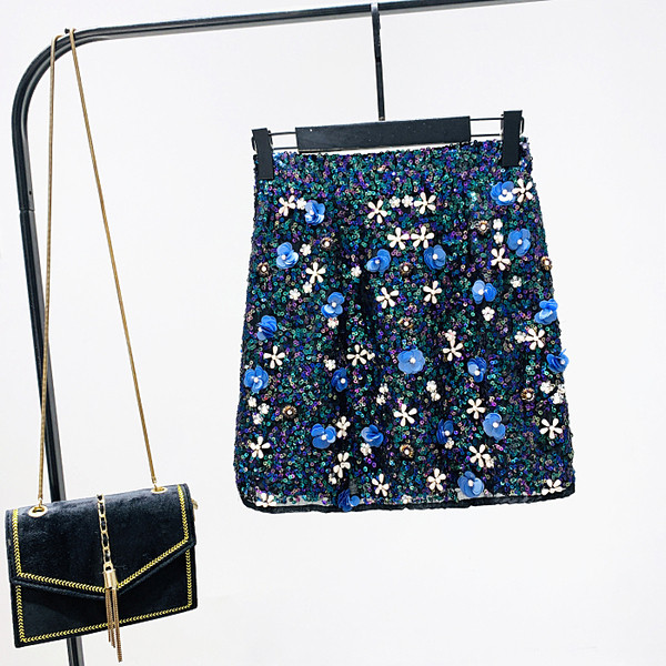 Új modell női szoknya flitterekkel és kék 3D elemmel