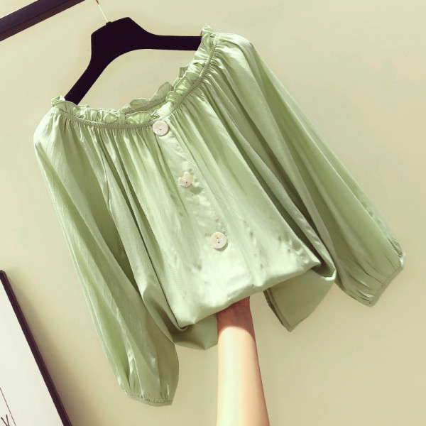 Alkalmi női ing gombokkal és kerek nyakkivágással