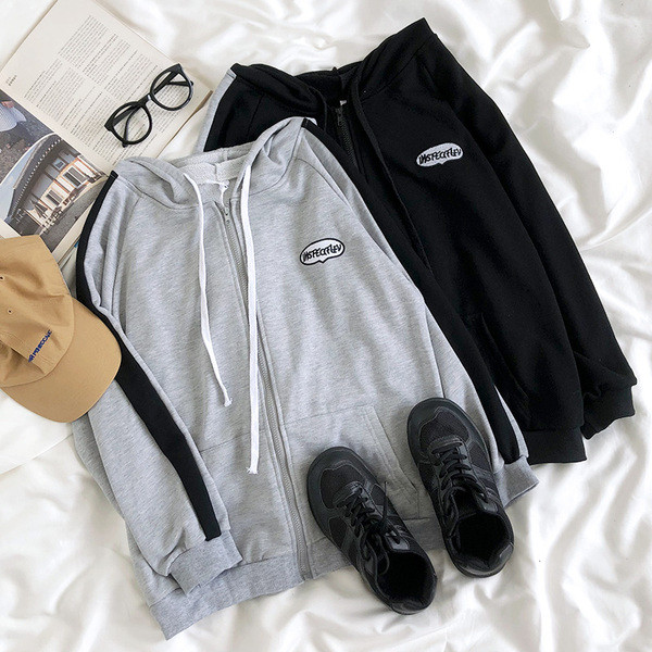 Női alkalmi pulóver cipzárral és hímzéssel