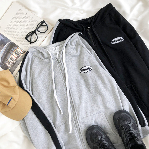 Női alkalmi pulóver cipzárral és hímzéssel