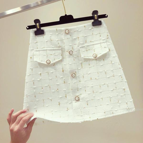 Női kockás szoknya gombokkal, magas derékkal