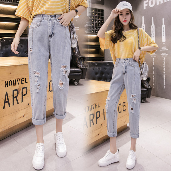 Női farmer gumírozott derékkal, jobbra szakadt