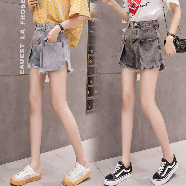 Női alkalmi rövidnadrág szakadt mintával és zsebekkel