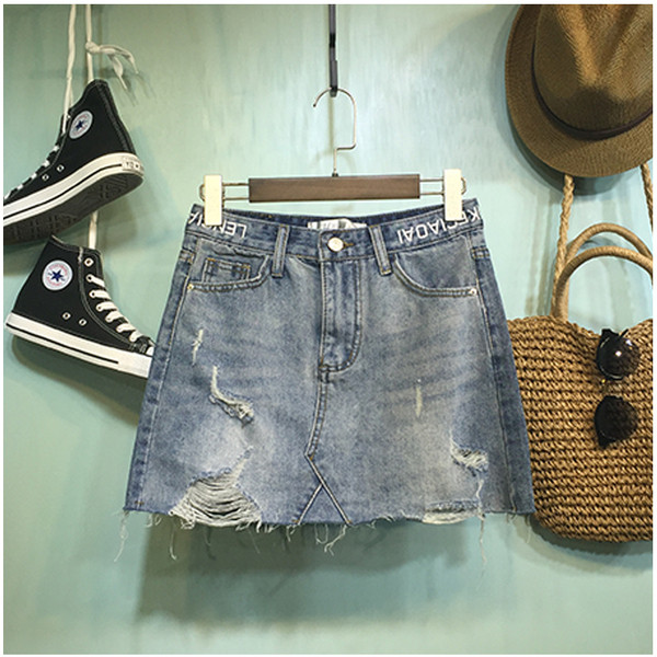 Női farmerszoknya, magas derékkal, szakadt motívumokkal