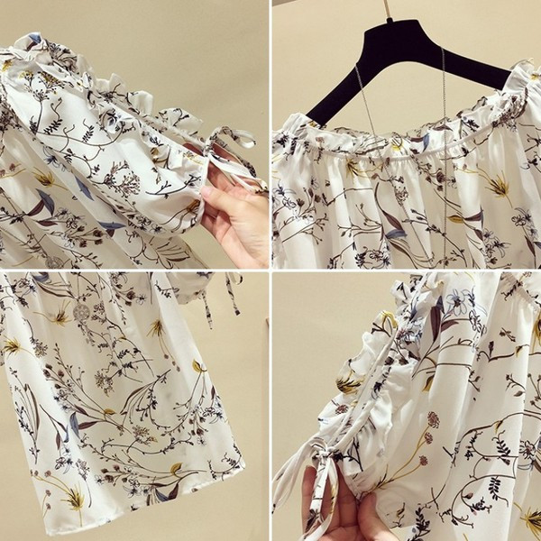 Modern női blúz virágmintával és ovális nyakkivágással