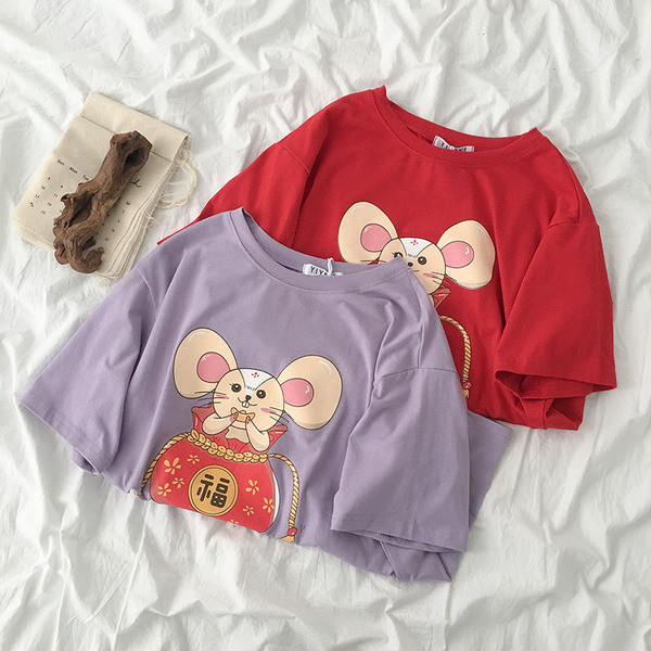 Alkalmi női póló mintával és rövid ujjal