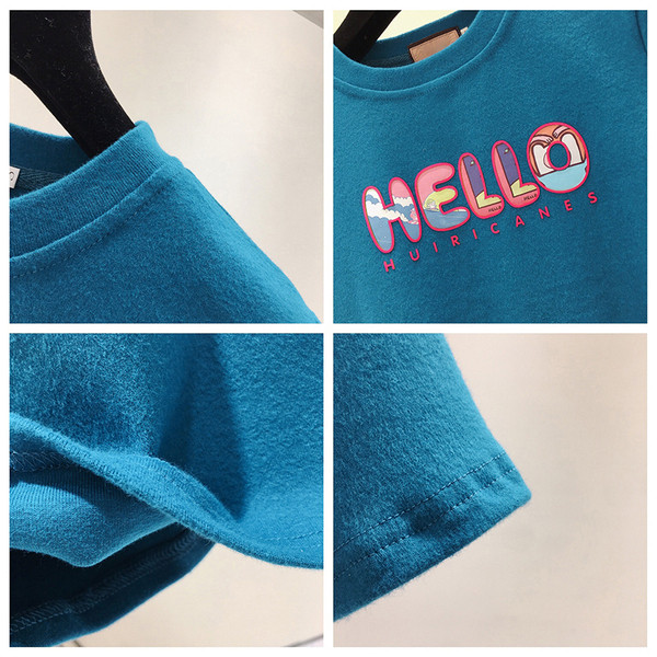 Női pamut póló rövid ujjal, ovális nyakkivágással és színes felirattal