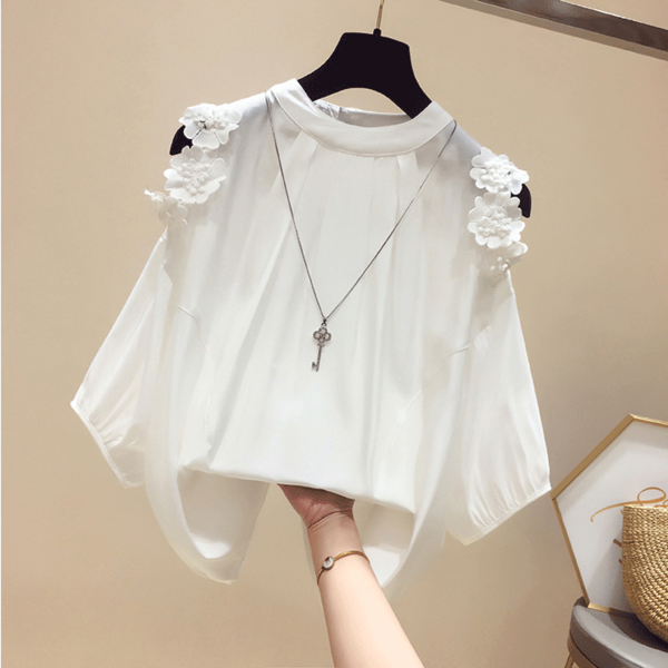 Modern női ing csupasz vállval és virágokkal