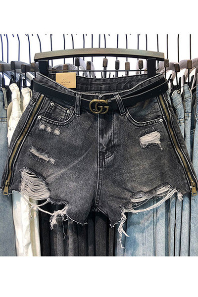 Női farmer rövidnadrág cipzárral és övvel