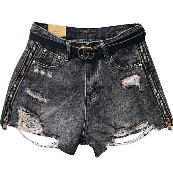 Női farmer rövidnadrág cipzárral és övvel