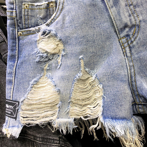 Új Modern női rövidnadrág szakadt motívumokkal