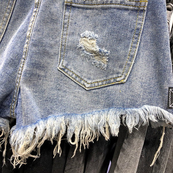 Új Modern női rövidnadrág szakadt motívumokkal