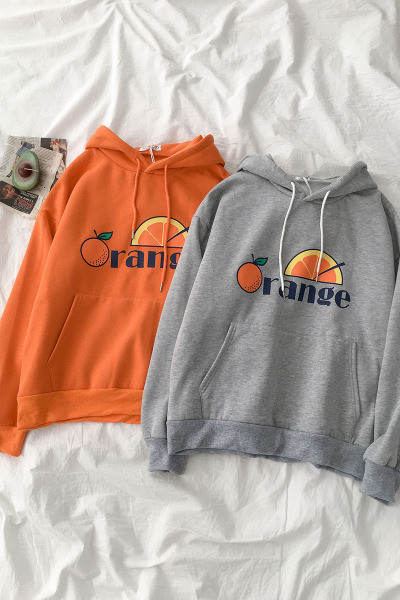 Napi női pulóver zsebbel és rátéttel