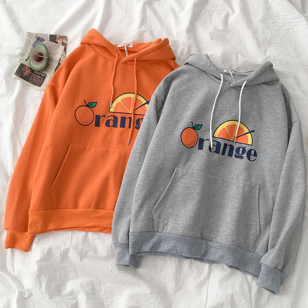 Napi női pulóver zsebbel és rátéttel