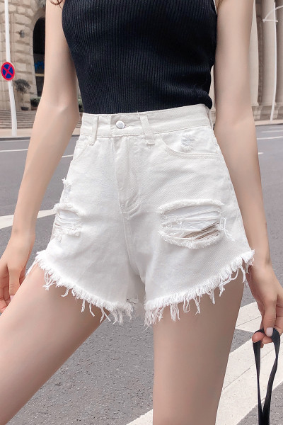 Aktuális rövid női farmer magas derékkal, szakadt motívumokkal