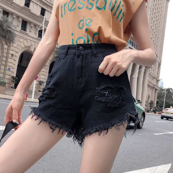 Aktuális rövid női farmer magas derékkal, szakadt motívumokkal