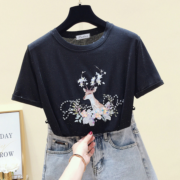 Modern női blúz flitterekkel és mintával