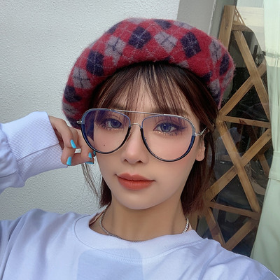 Дамски модерни очила в кръгла форма и тънка рамка 