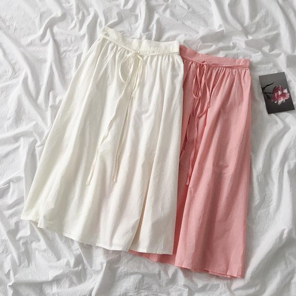 Ležerna ženska suknja s vezicama i visokim strukom