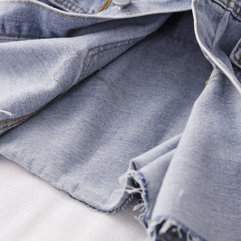 Rövid farmerdzseki zsebekkel és bőrgallérral