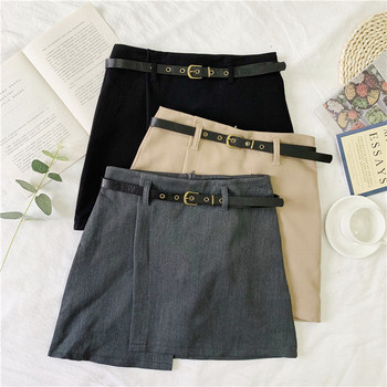 Asimetrična ženska suknja s visokim strukom i kožnim remenom