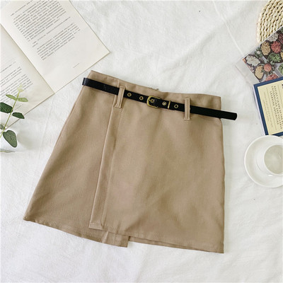 Asimetrična ženska suknja s visokim strukom i kožnim remenom