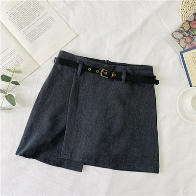 Asimetrična ženska suknja s visokim strukom i kožnim remenom