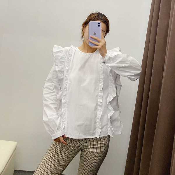 Naiste vabaaja lokkidega pluus valge