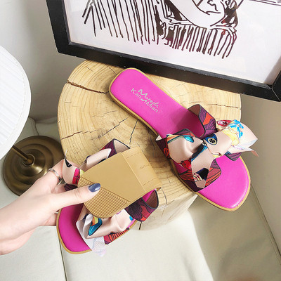 Modern női papucs lapos talppal, színes szalaggal