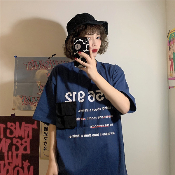 Tricou de dama modern cu aplicatie si buzunar