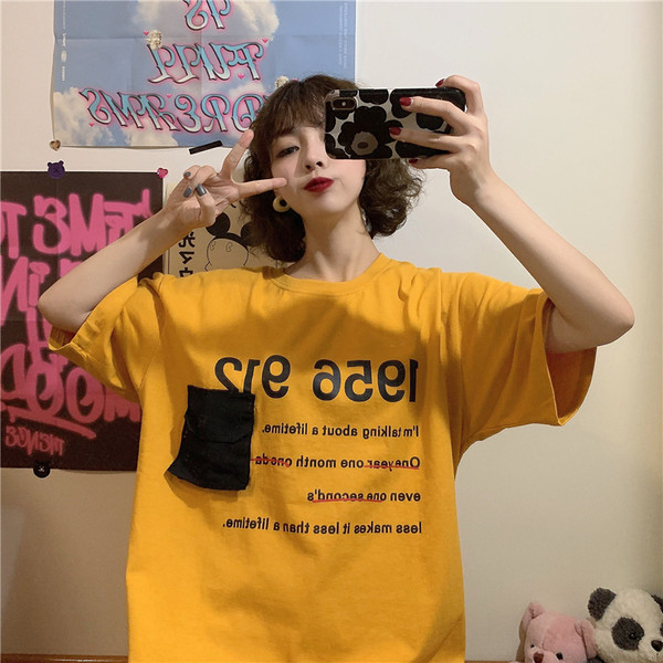 Tricou de dama modern cu aplicatie si buzunar