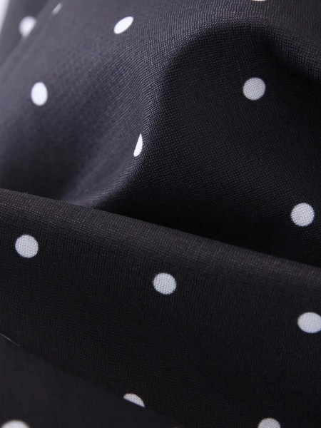 Jachetă neagră de damă de ultimă generație cu puncte albe și decolteu în V