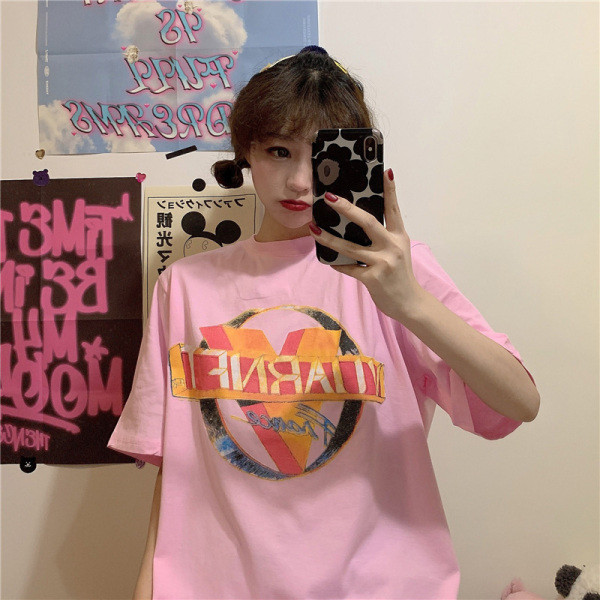 Alkalmi női póló mintával és kerek nyakkivágással - széles modell