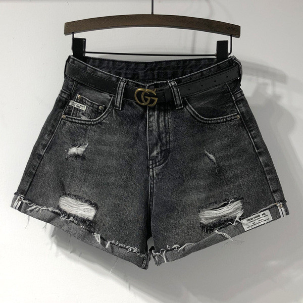 Női rövidnadrág magas derékkal, szakadt motívumokkal