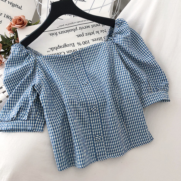 Bluză de damă lată în carouri, cu mâneci scurte și mâneci strânse