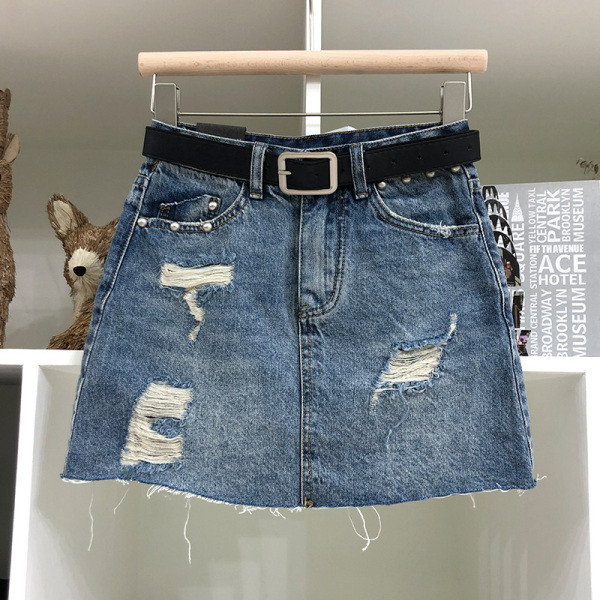 Traper ženska suknja asimetričnog modela sa poderanim motivima