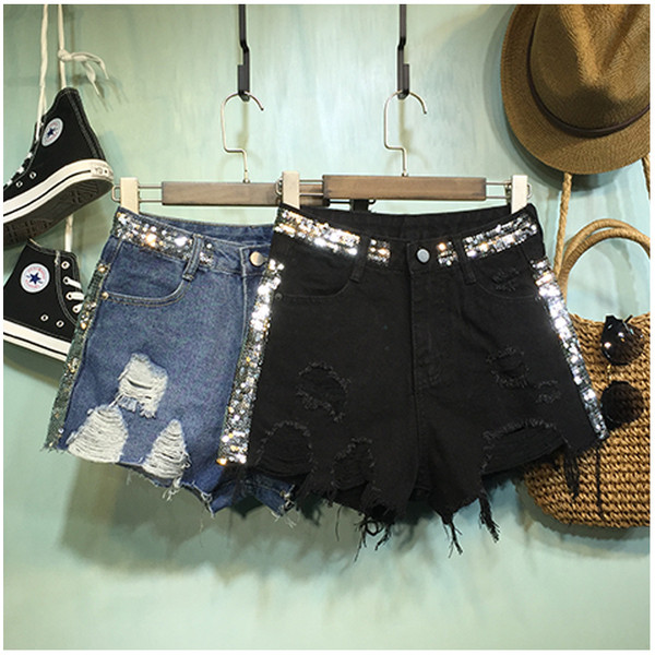 Női modern rövidnadrág flitterekkel, szakadt motívumokkal