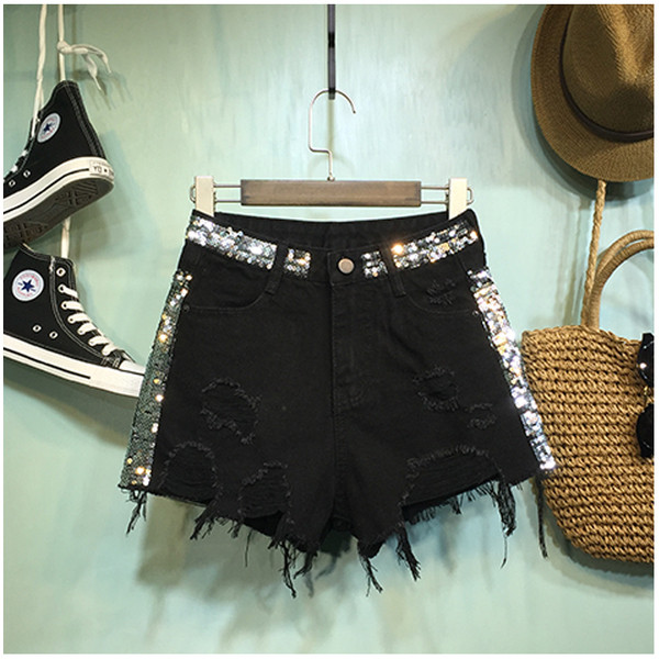 Női modern rövidnadrág flitterekkel, szakadt motívumokkal