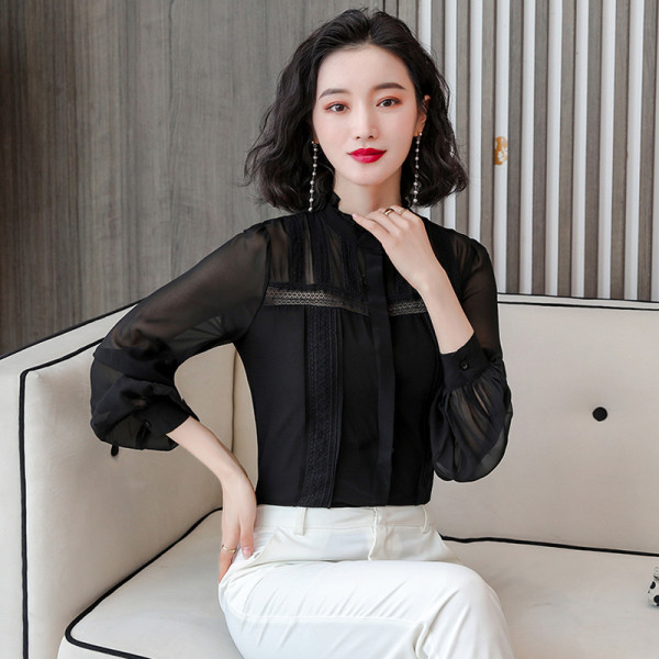 Elegantna ženska košulja sa širokim rukavima i gumbima