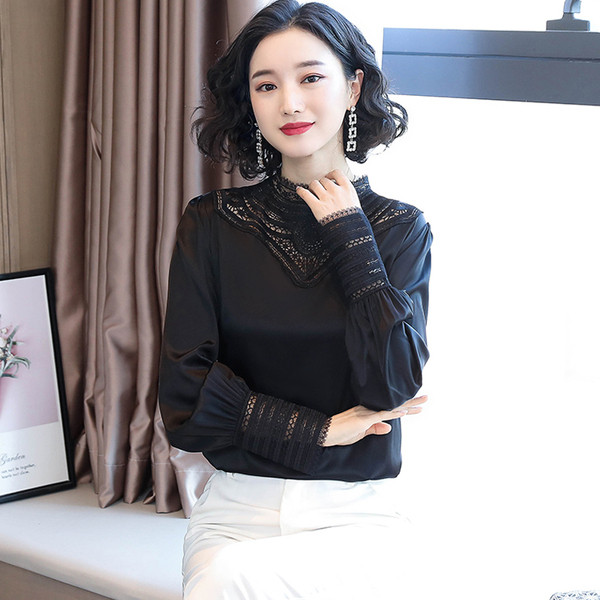 Ženska svilena bluza s niskom kragnom i dugim rukavima