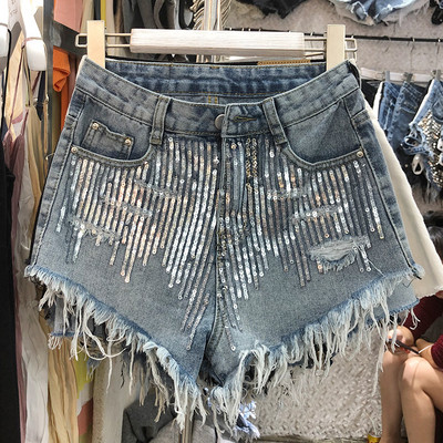 Női rövidnadrág új modellje elemmel - flitterekkel