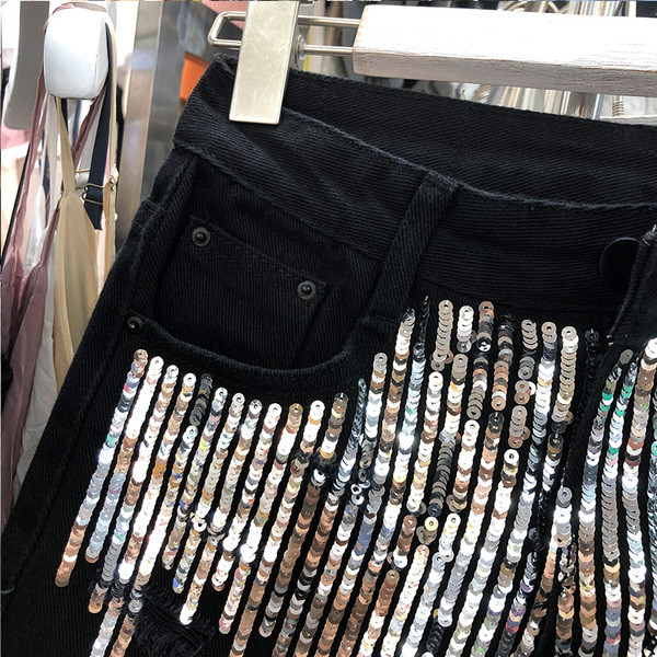 Női rövidnadrág új modellje elemmel - flitterekkel