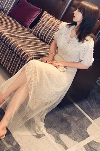 Ženski komplet čipkane bluze kratkih rukava i suknje visokog struka i tila