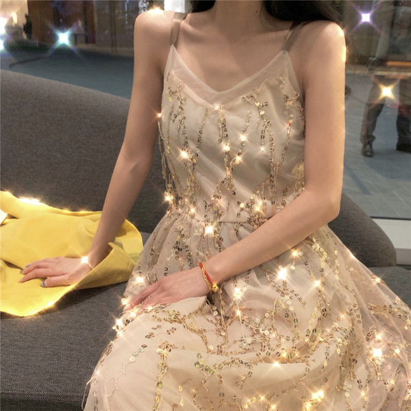 Rochie lunga de dama cu spatele gol si paiete