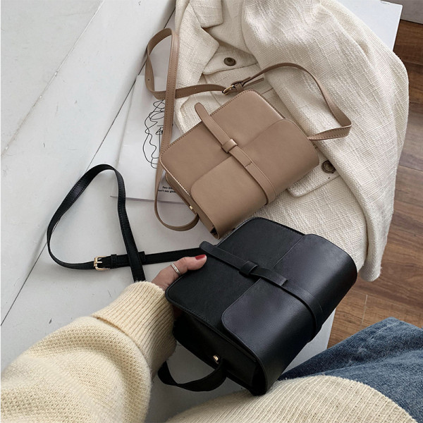 Modern női bőr táska fém rögzítéssel