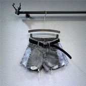 Női rövidnadrág új modellje övvel, szakadt motívumokkal