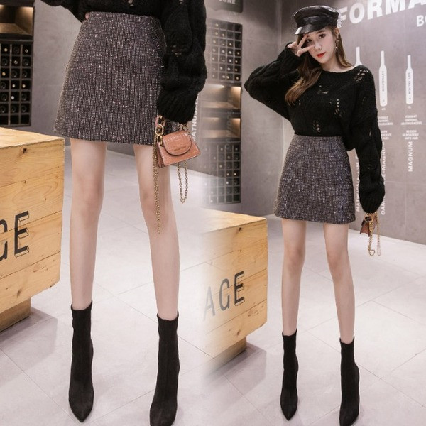 Modern női rövid szoknya magas derékkal és kövekkel