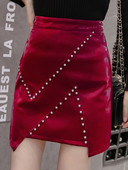 Aszimmetrikus bőr női szoknya magas derékkal, fém részletekkel